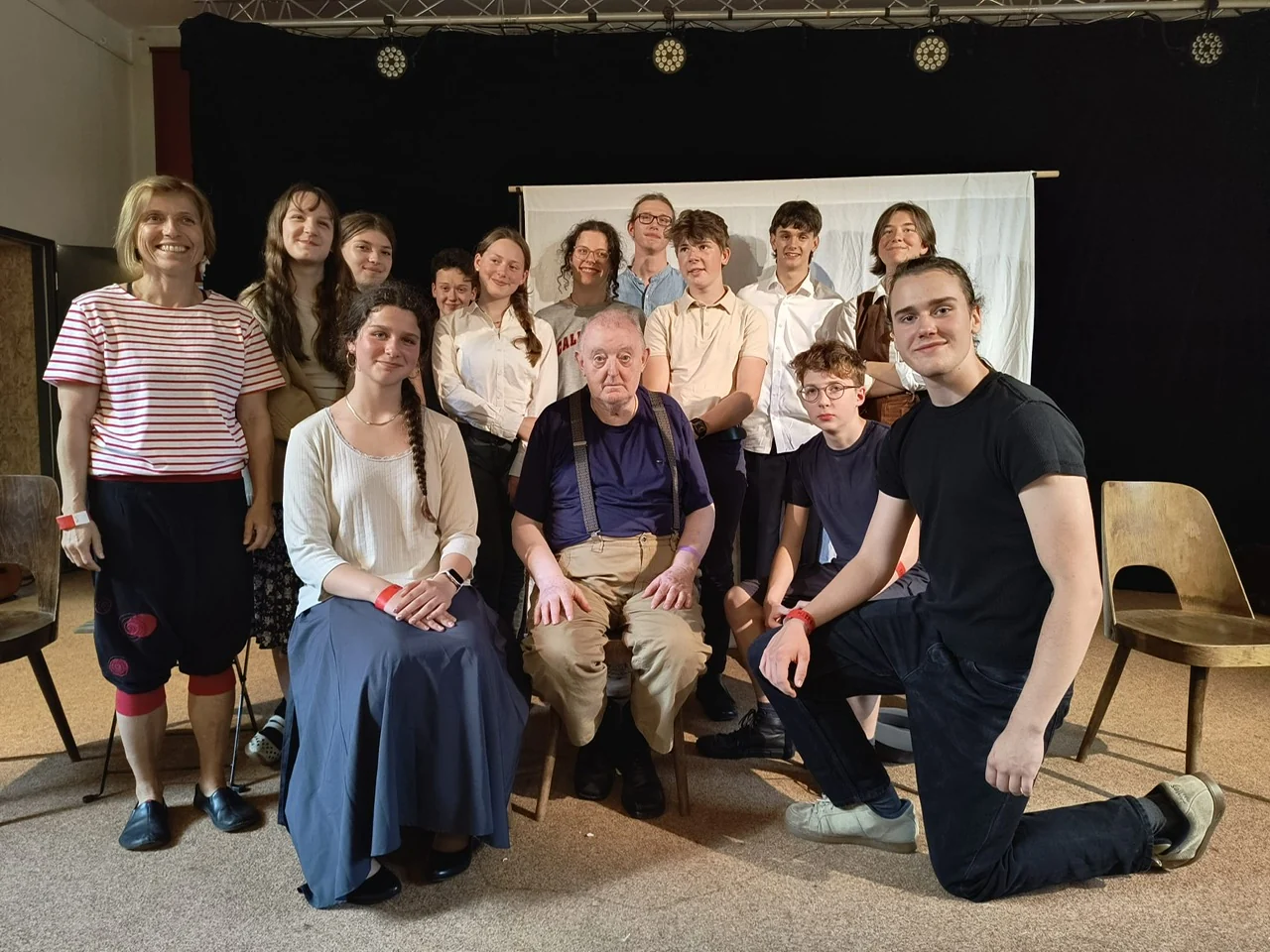 The Memory of Nations Theatre group posing with Jan Jelínek