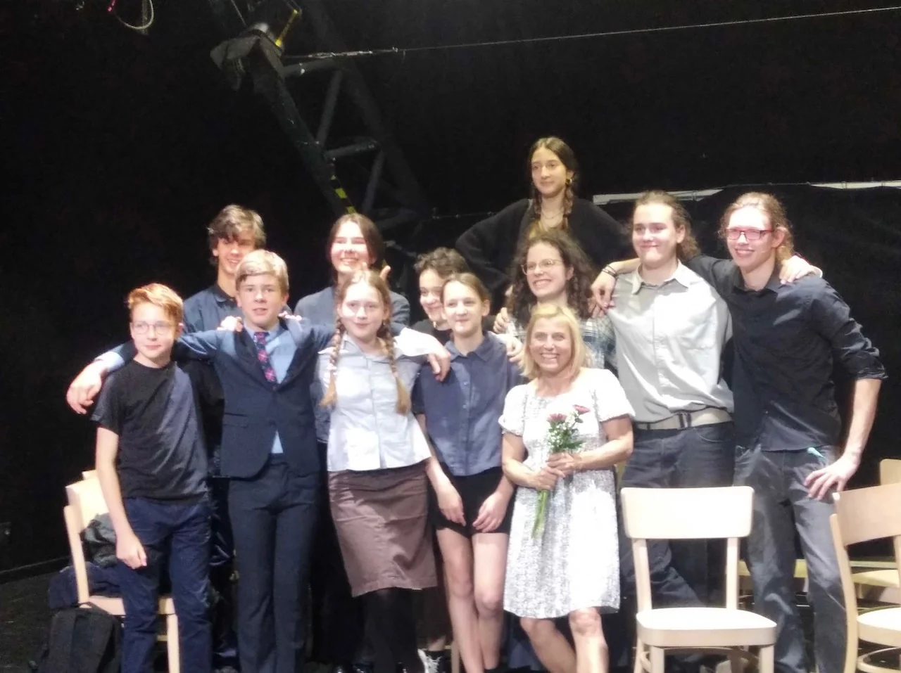 The cast of Jiní jinam, a production about Jan Jelínek, posing together after a performance